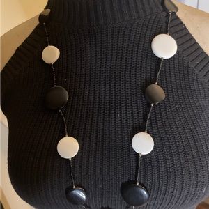 Long black and white beaded necklace. Sixty’s style. Perfect for any outfit.